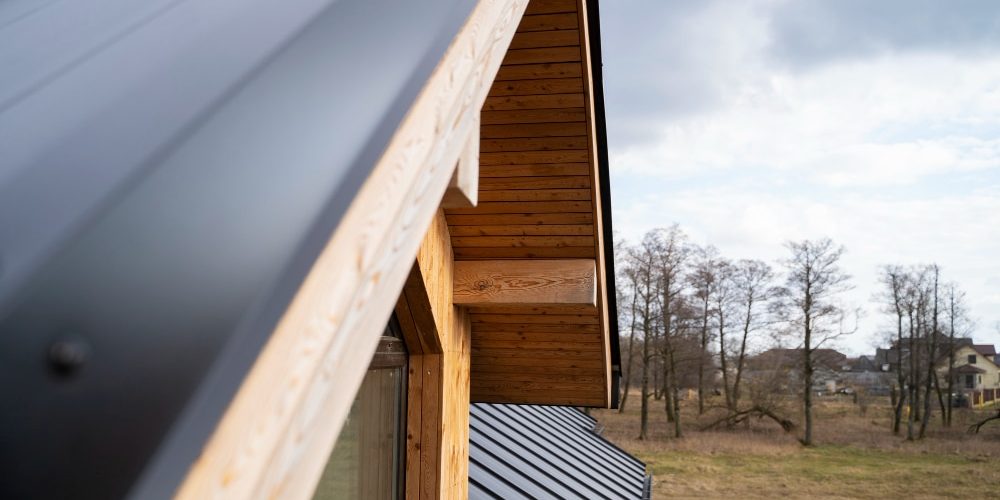 Image of a newly installed roof with fresh shingles, demonstrating the outcome of a roof replacement.